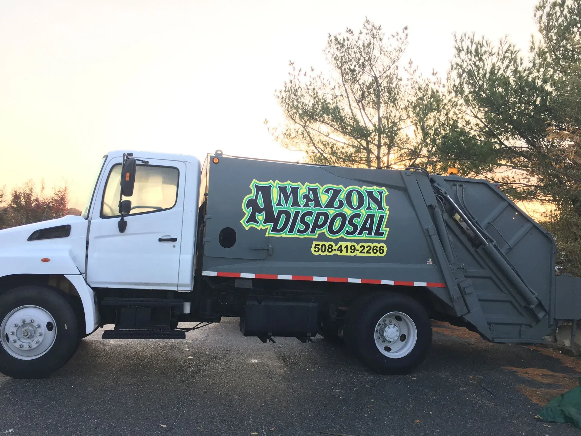 Amazon Disposal truck serving a Cape Cod residential neighborhood